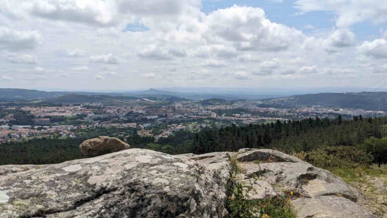 View of Santiago de Compostela from the top of Monte Pedroso, with the cathedral visible in the distance.