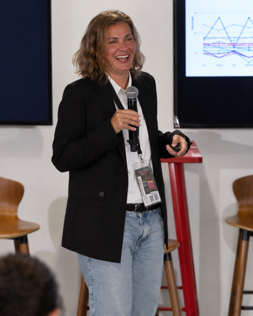Heather McDaniel speaking during a live presentation.